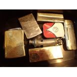 Seven assorted lighters including Zippo Ronson etc and a Acme boy scout whistle