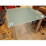 Square glass top dining table with tubular chrome legs 90 x 90 cm H: 76 cm