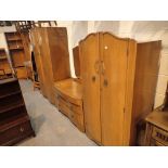 Bedroom suite in light oak large and small wardrobe with three drawer dressing table