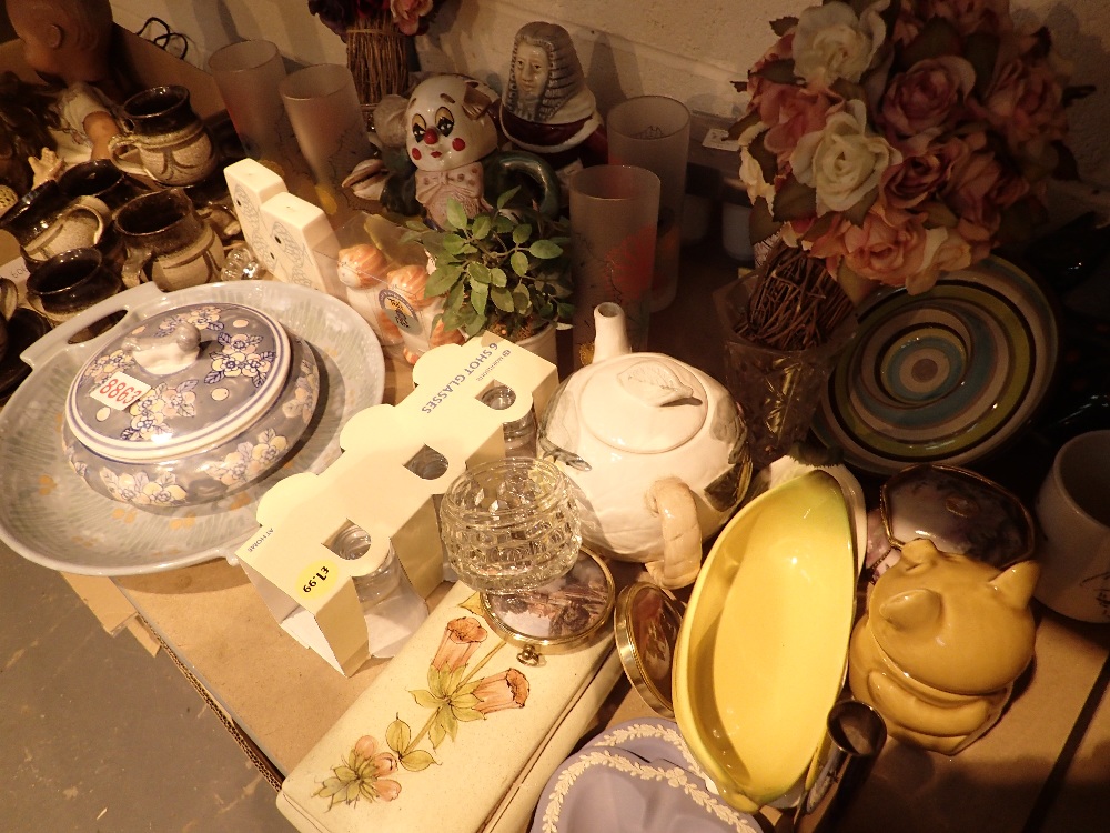 Shelf of mixed ceramics and glass