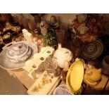 Shelf of mixed ceramics and glass