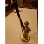 Brass poker housed in a stand representing a highland soldier and a rootwood walking stick possibly