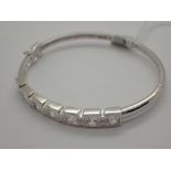 White metal stone set hinged bangle