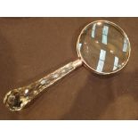 Large magnifying glass with glass handle