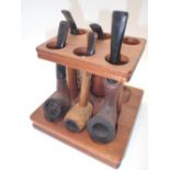 Pipe stand and five vintage pipes