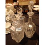 Three cut glass crystal decanters