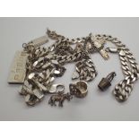 Silver hallmarked and 925 stamped curb bracelet and necklace with ingots crucifix and charms