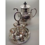 Silver plated self pouring tea pot and set of four egg cups