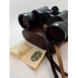 Pair of cased Carl Zeiss Jena Jenoptem 10x50 binoculars in good condition with guarantee