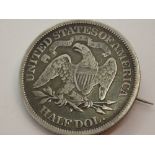 1876 USA silver half dollar coin formed as brooch