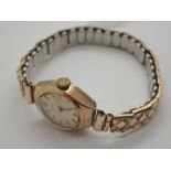 9ct gold vintage ladies Smiths wristwatch on an expanding excalibur bracelet