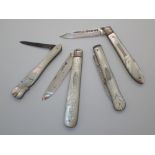 Four mother of pearl penknives three with silver blades