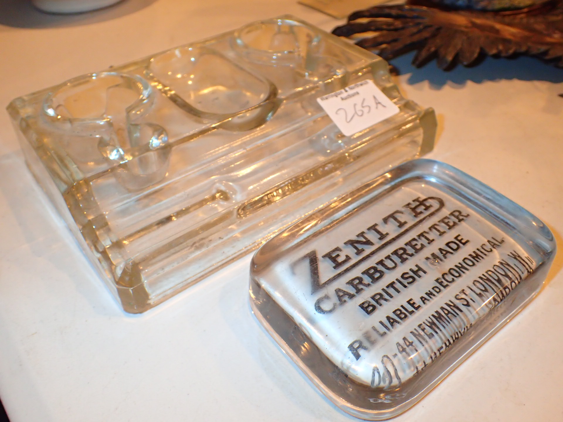 Glass pen set and a Zenith carburetted glass paperweight