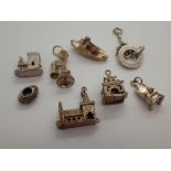 Eight various silver charms
