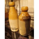 Two stoneware ginger beer bottles