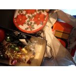 Box of Christmas related decorations wrapping papers etc