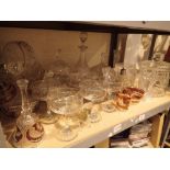 Shelf of glassware and cut glass containers baskets bowls barrels etc