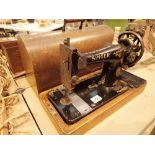 Oak cased Singer hand cranked sewing machine