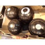 Set of four bowling bowls