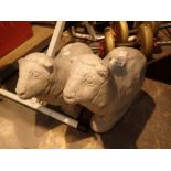 Two cast stone garden sheep ornaments