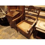 Oak framed commode with cane seat