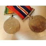 Two WWII medals Defence and Victory