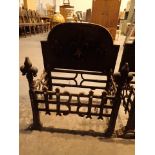 Vintage cast iron fire grate with back plate and fleurs de lys designs