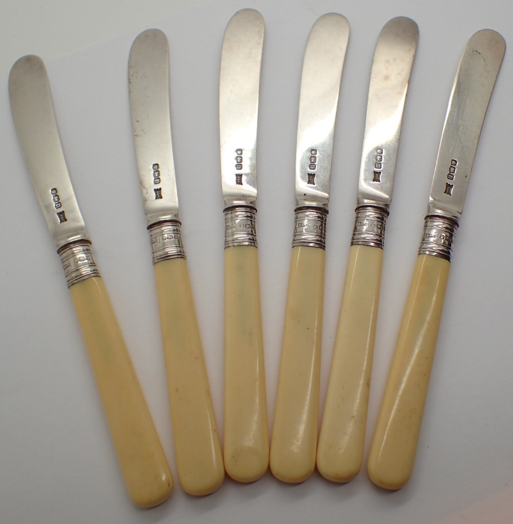 Set of six Walker and Hall silver bladed butter knives each with ivorine grips and silver collars