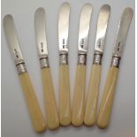 Set of six Walker and Hall silver bladed butter knives each with ivorine grips and silver collars