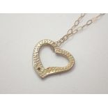 9ct gold diamond set heart pendant on 9ct gold necklace