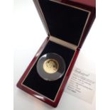 Tristan da Cunha boxed silver gilt commemorative five pound coin set with rubies boxed with