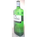 One litre bottle of Gordons special dry London gin 37.