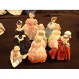 Eight Royal Doulton figurines all first quality