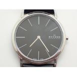 Skagen Denmark slimline black faced gents wristwatch in stainless steel case on a genuine Skagen