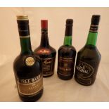 Collection of mixed alcohol bottles including Three Barrels brandy sherry and Tia Maria