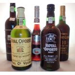 Five bottles to include Royalo Porto white port and ruby port Saint Clair 10 year old port ruby