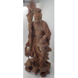 Carved wooden Chinese figurine with stork