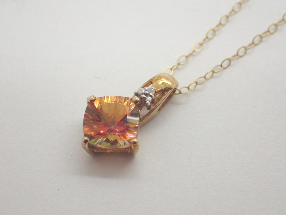 9ct gold fancy stone set pendant on 9ct gold necklace