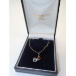 9ct gold chain and aqaumarine fob