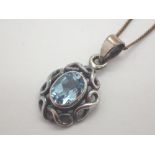 Silver blue topaz pendant on silver necklace both stamped 925