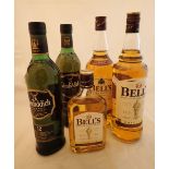 Two bottles of Bells whisky two bottles of Glendfiddich single malt whisky and a half bottle of