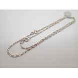 Silver fancy bracelet and anklet set