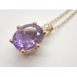 9ct gold oval amethyst and diamond pendant on 9ct gold necklace