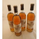 Four bottles of 1983 Chateau Coutet A Barsac racked and cellared