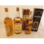 Five bottles of Scotch whisky including Bells Grants and Johnnie Walker Red Label