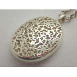 Sterling silver fancy locket with magnetic fastener fully hallmarked on silver belcher chain