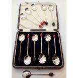 Cased set of six hallmarked silver coffee spoons and a set of six EPNS coffee spoons