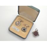 9ct gold on silver diamond cut cufflinks and a hallmarked silver garnet spinning fob