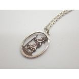 Tested silver fancy St Christopher oval pendant on silver chain stamped 925 L: 48 cm