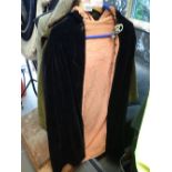 Ladies black velvet cloak with pink lining and hood